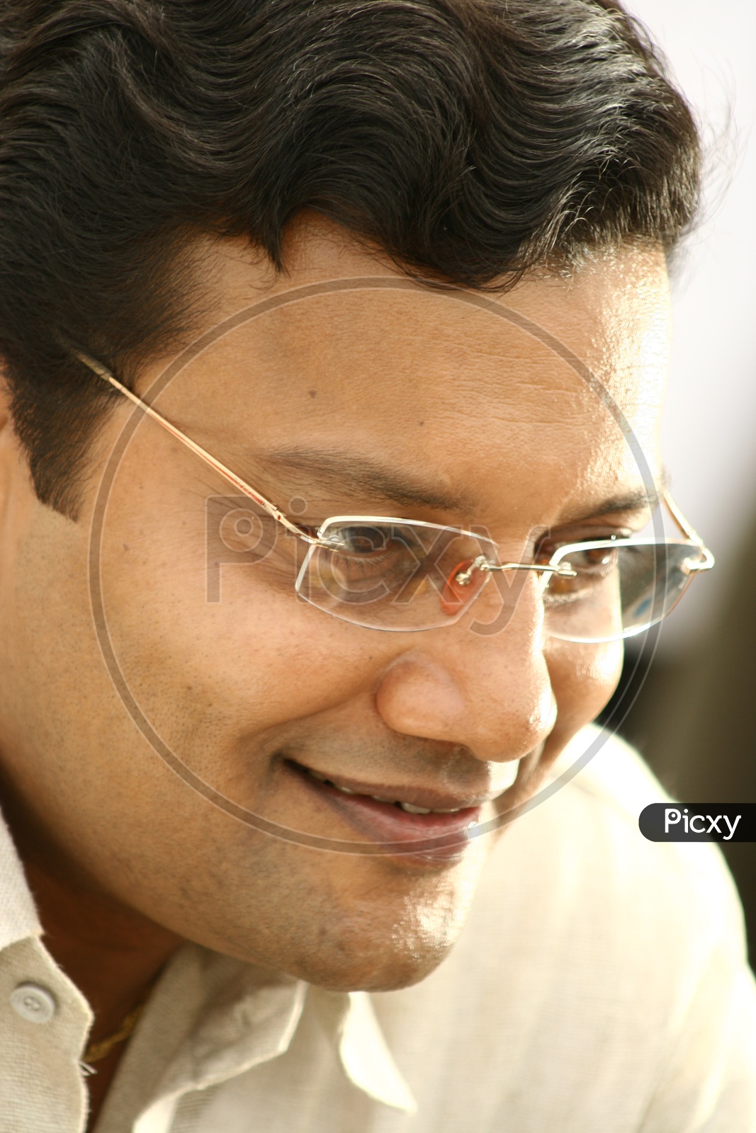 Actor Sai Kumar wearing glasses