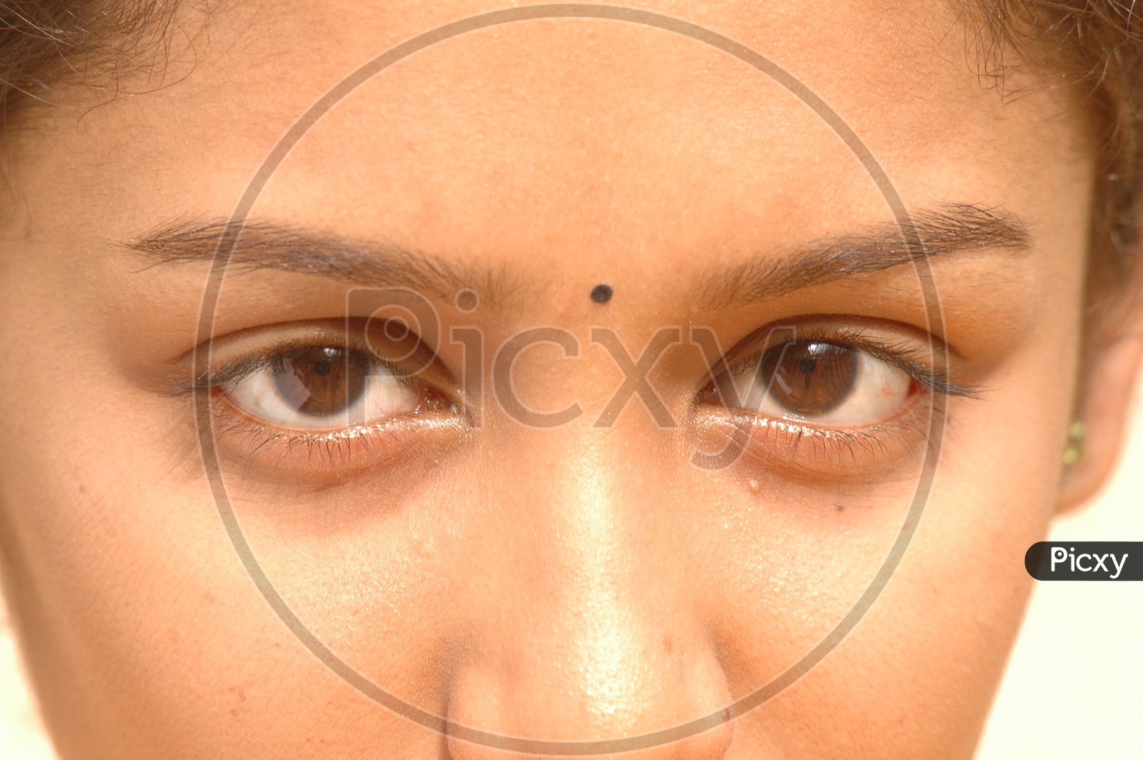 Indian girl eyes with bindi