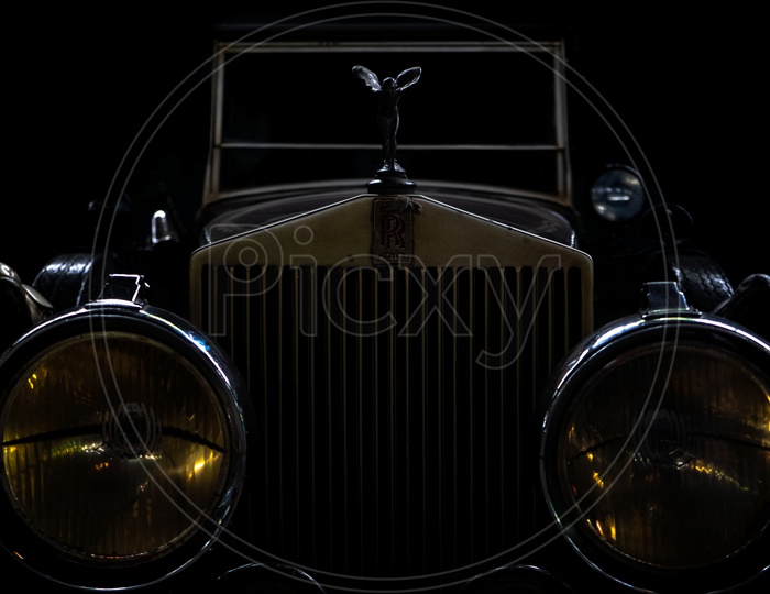 Vintage Rolls Royce in dark room