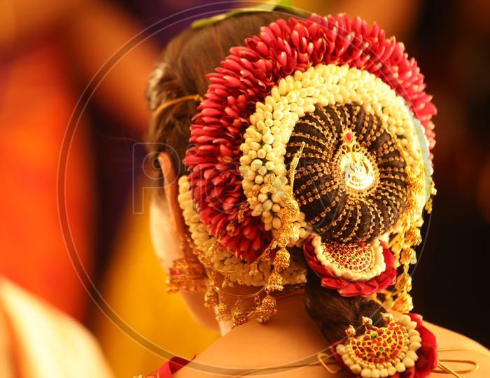 Indian bride with her hair decorated
