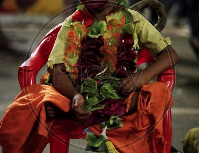 Kid dressed up as hanuman on last day of visarjan