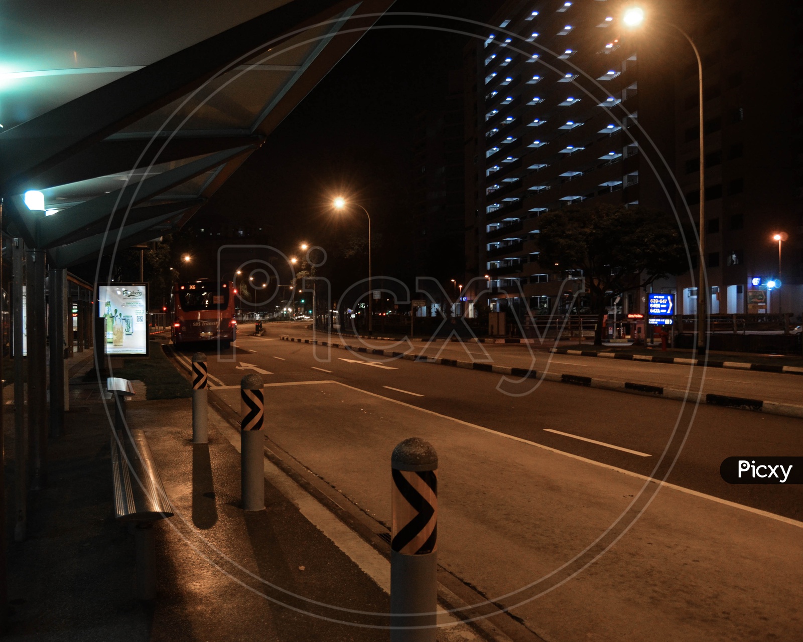 Bus stop view in Singapore at night