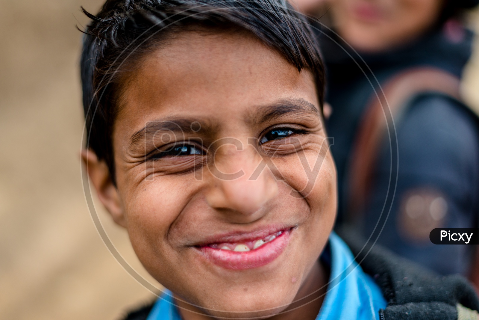 Portrait of School Kid Smiling at Sainj Valley