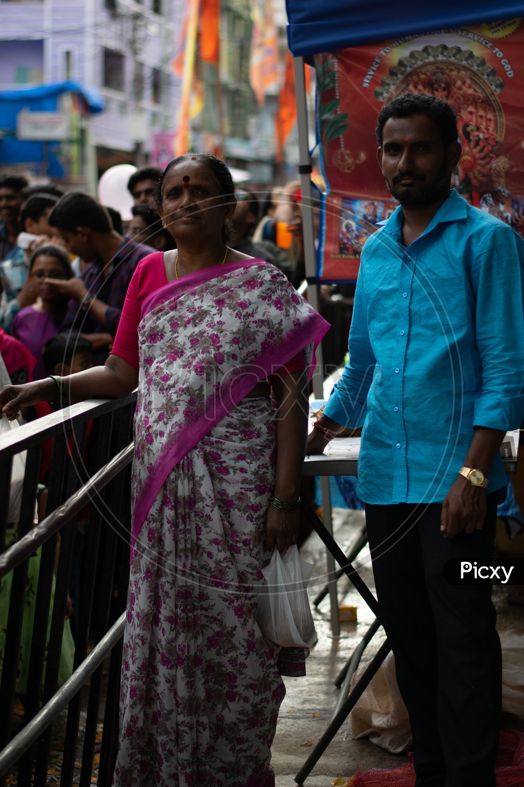Indian mother with her son at Khairatabad Ganesha Temple