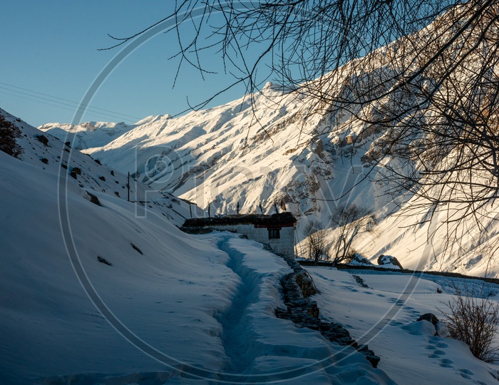 Trekking Path in Snow at Spiti Valley Covered with Snow on Mountains