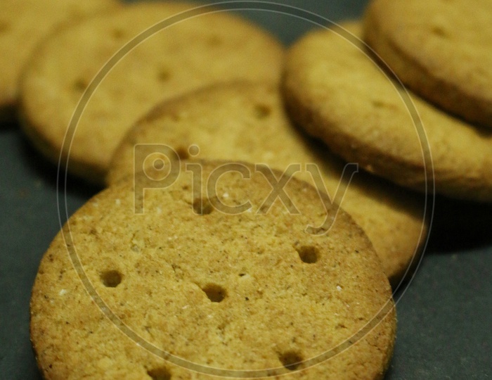 Close up of biscuits on a black background
