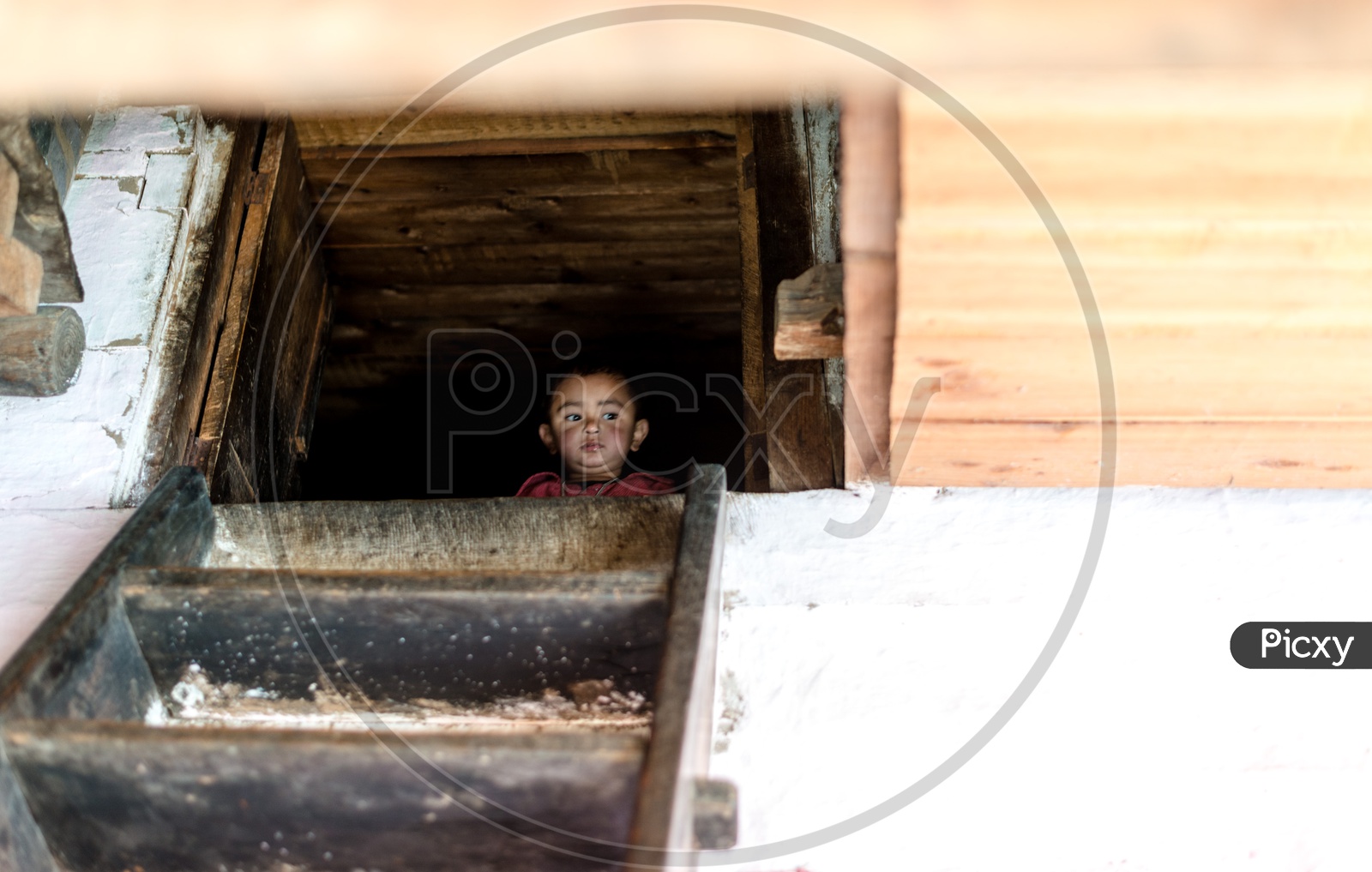 A Little Kid in House at Sainj valley