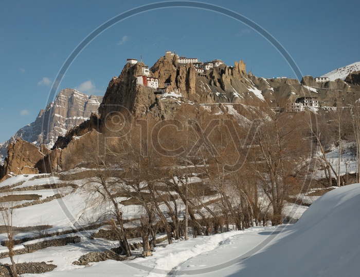 Dhankar Monastery on Mountain Surrounded by Snow in Winter