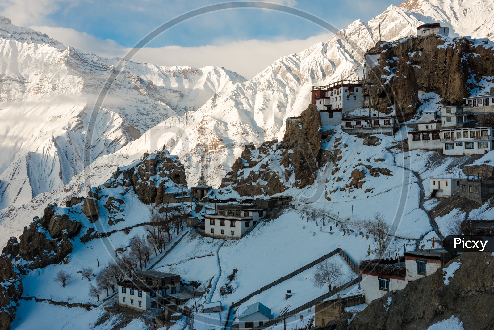 Dhankar Village Covered in Snow Surrounded by Snowy Himalayan Mountains