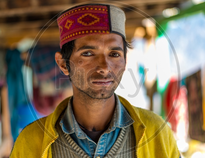 Premium Photo | Saying hi a boy from himachal pradesh in traditional dress