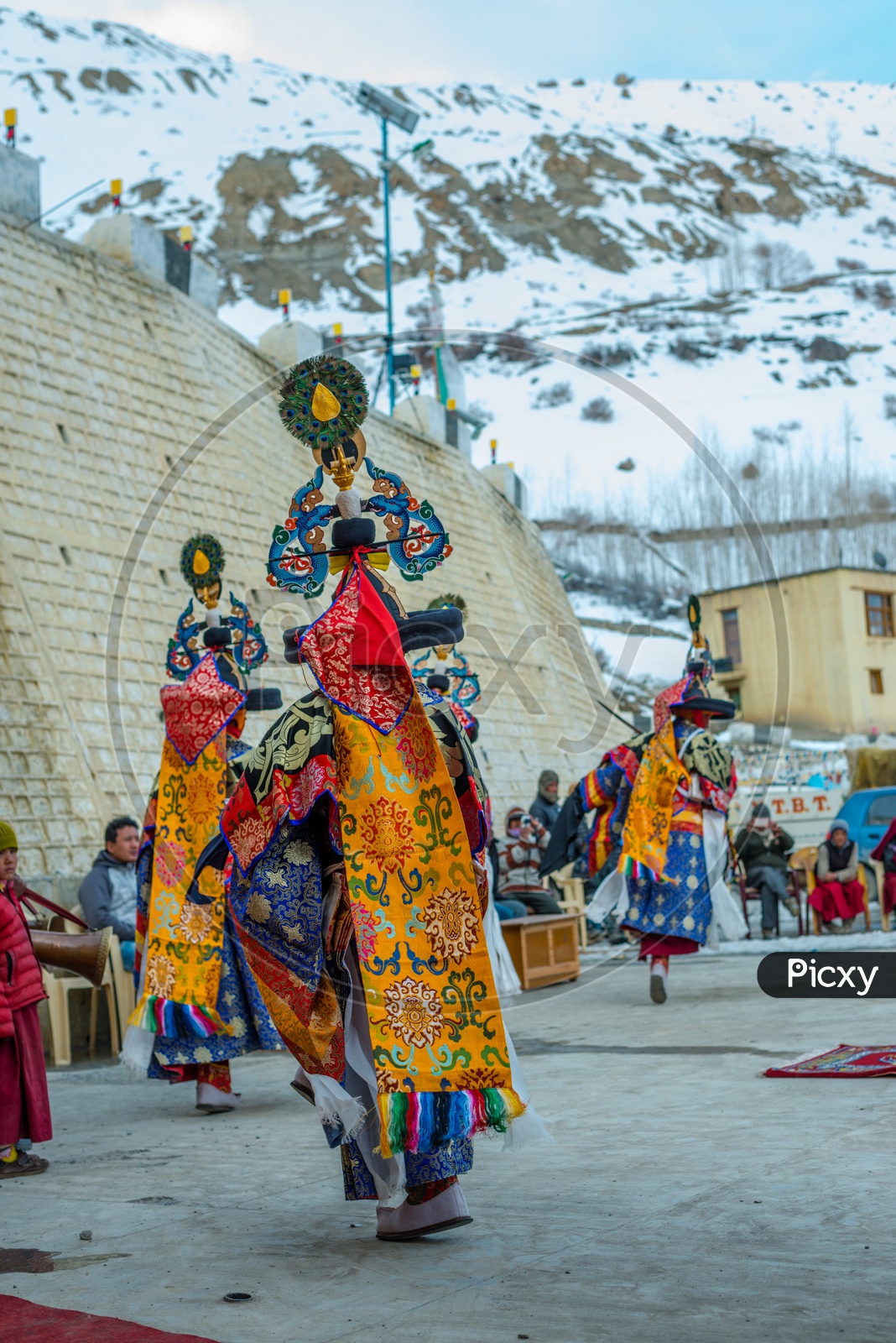 Tibetan Buddhist lamas dressed in mystical mask dance Tsam mystery