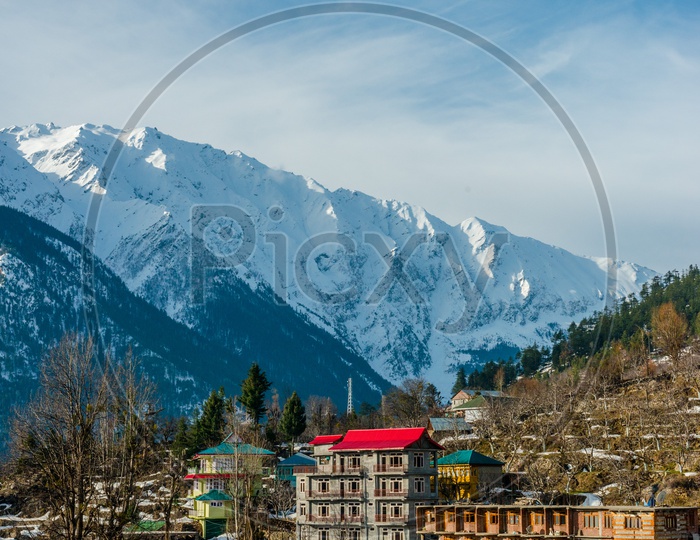 Landscape of himalayas with colorful houses during morning