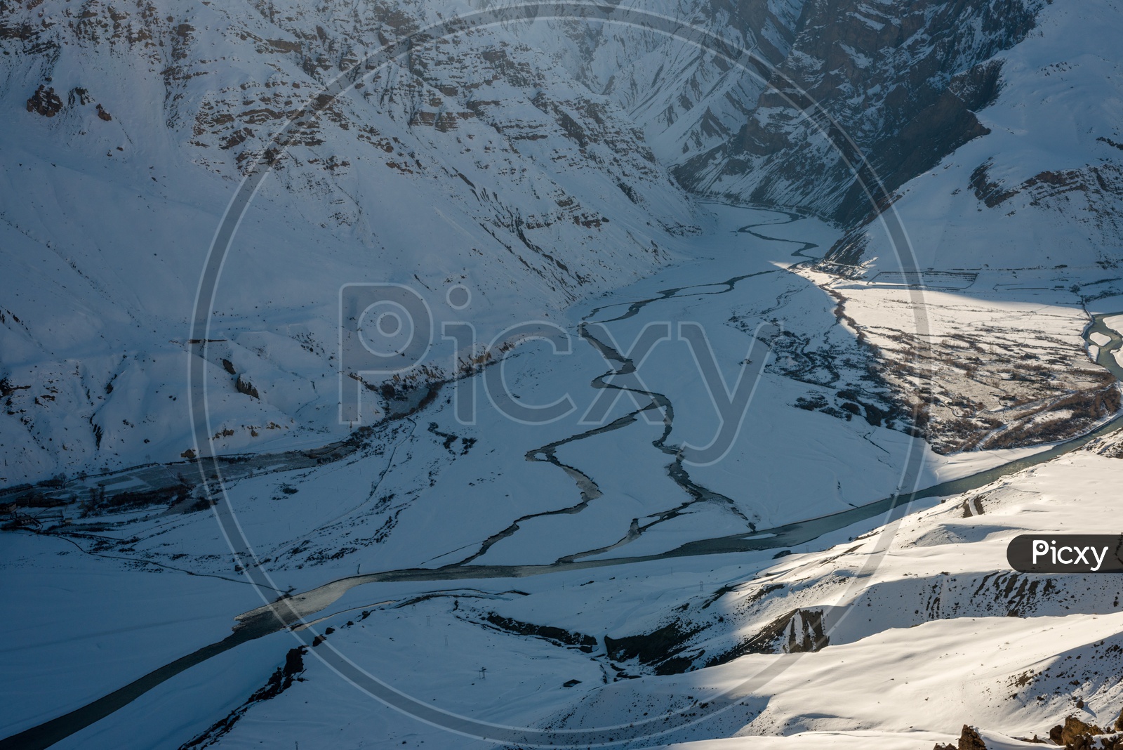 Pin River and Spiti River Surrounded by Snowy Mountains in Winter Months in Himalayas