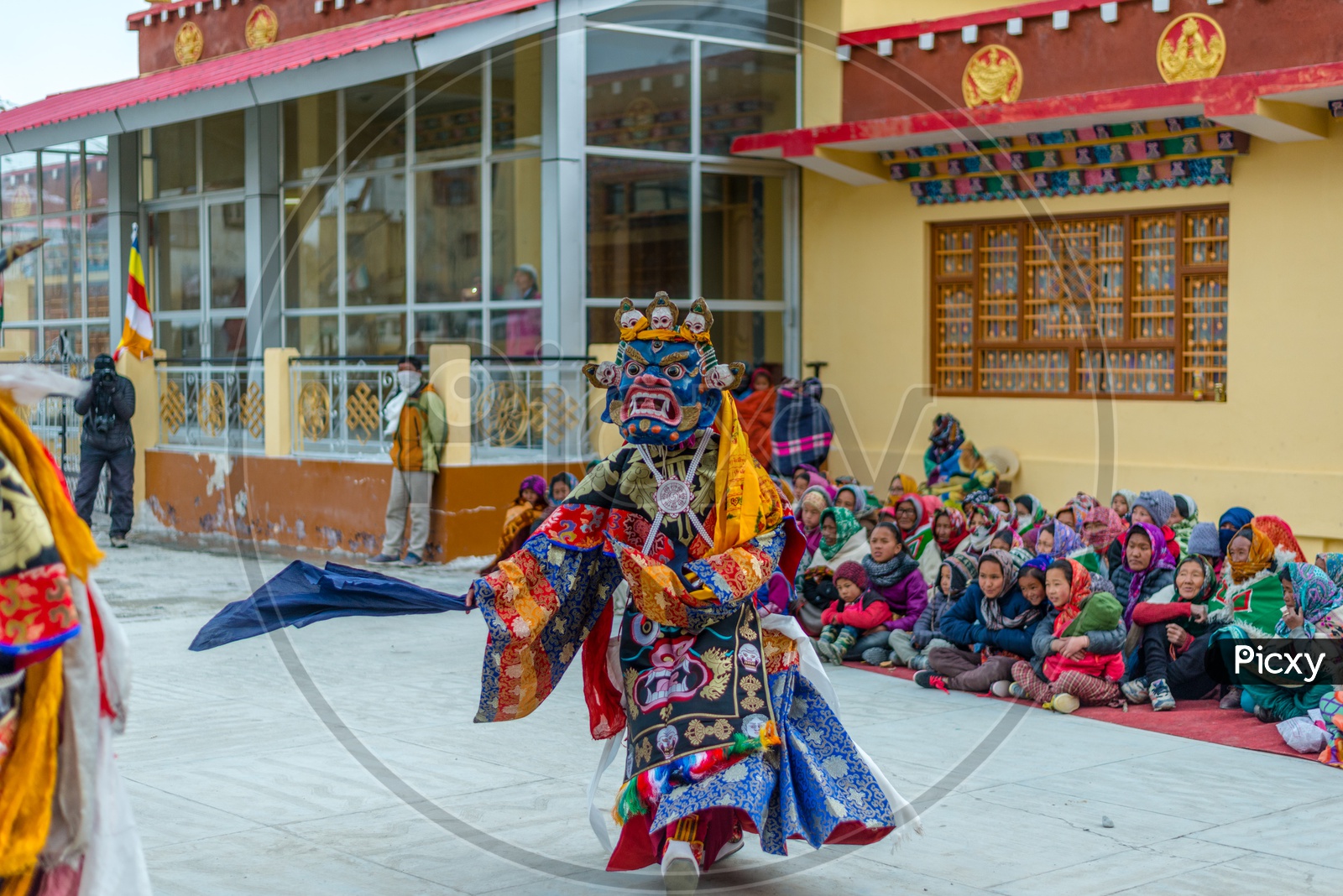 Tibetan Buddhist Lamas dressed in Mystical Mask Dance Tsam mystery in the time of festival