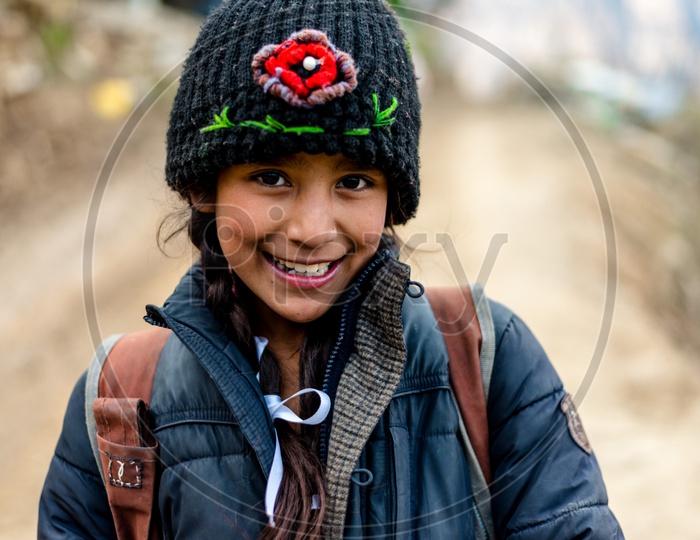 Portrait of Himalayan girl with Cap on Head