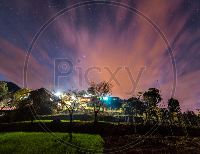 Night view of Village with Stars in Sky