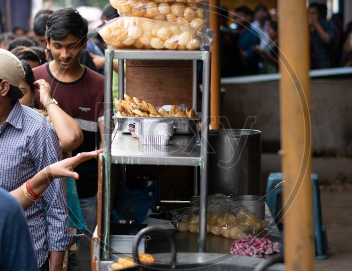 Pani Puri Shop with People in Background