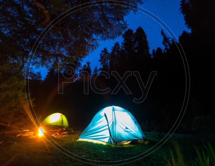 Night View of Camping Tent with Lights