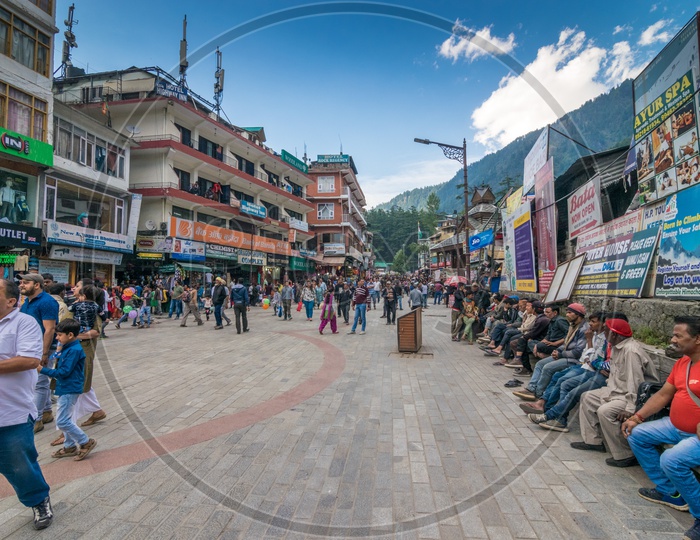 People roaming on the mall road at Manali