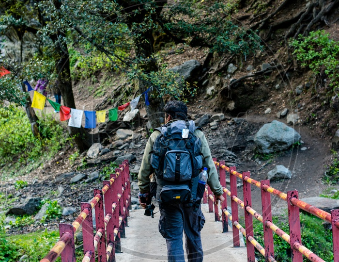 Trekker with backpack at Hamta Pass Trek in the Himalayan Ranges