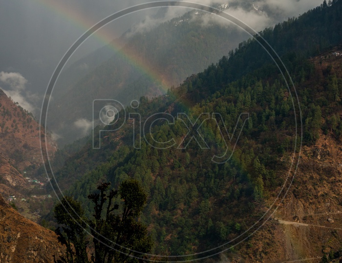 Rainbow over Himalayan Mountains