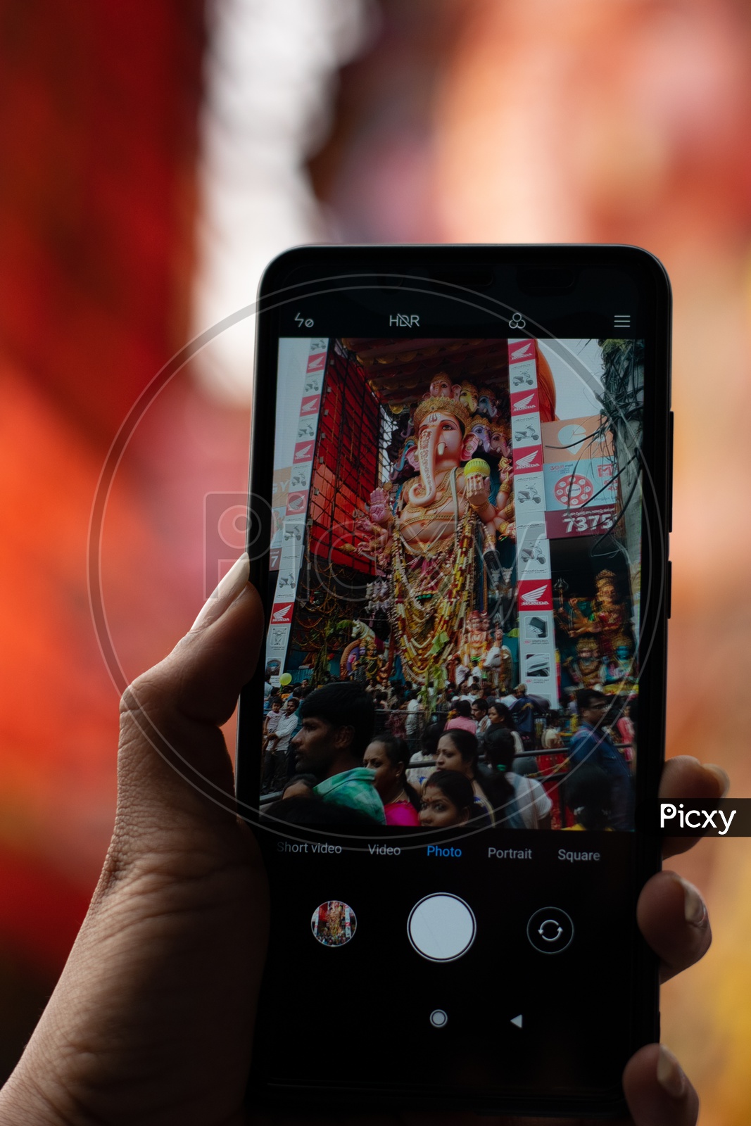 Khairatabad Ganesha Idol Capturing on Mobile or Smartphone
