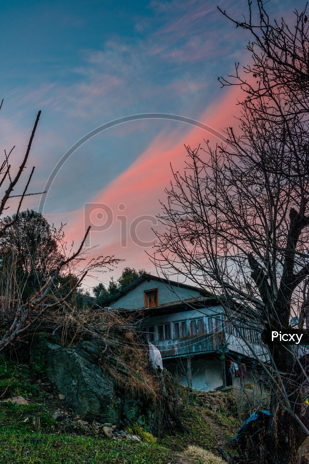 A House with Sunset in Background