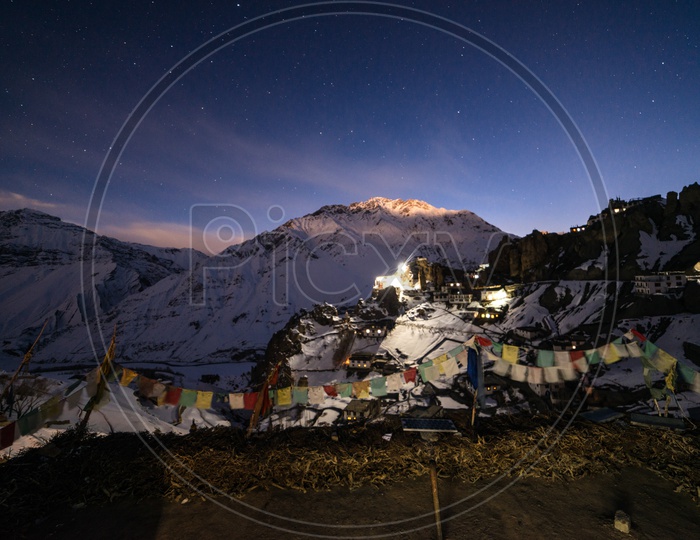 Spiti Village Covered in Snow with Stars in Sky