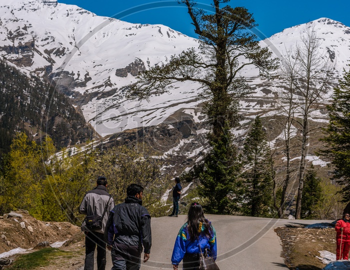 Tourists walking on the road at Gulaba View Point