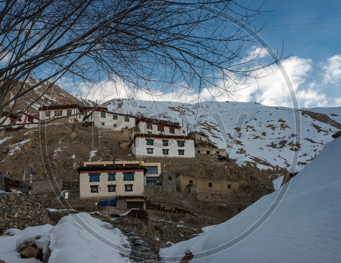 Houses in Dhankar Village on Mountain Covered with Snow in Winter