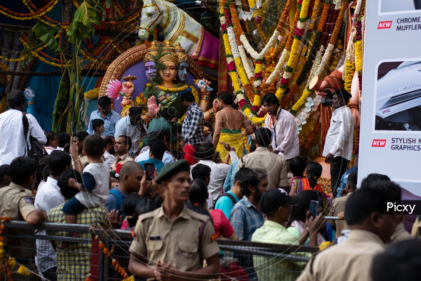 Devotees in Queue Line Taking Pictures of Khairatabad Ganesha Idol on Mobile or Smartphone