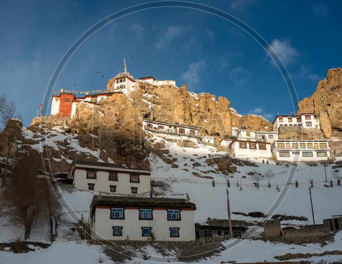 Sunrise over Dhankar Monastery Covered with Snow in Winter