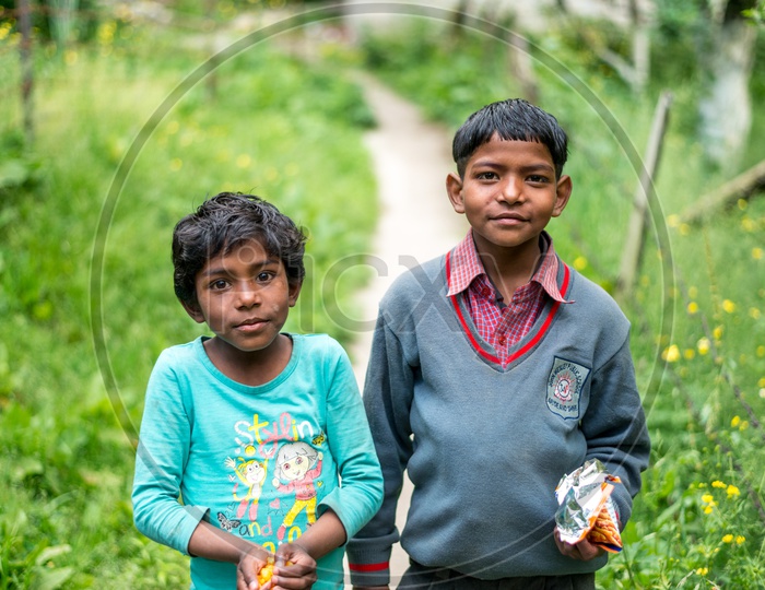Portrait of Indian Kids in a Flower Garden