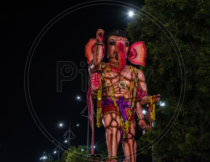 Admist lights stood high Ganesha