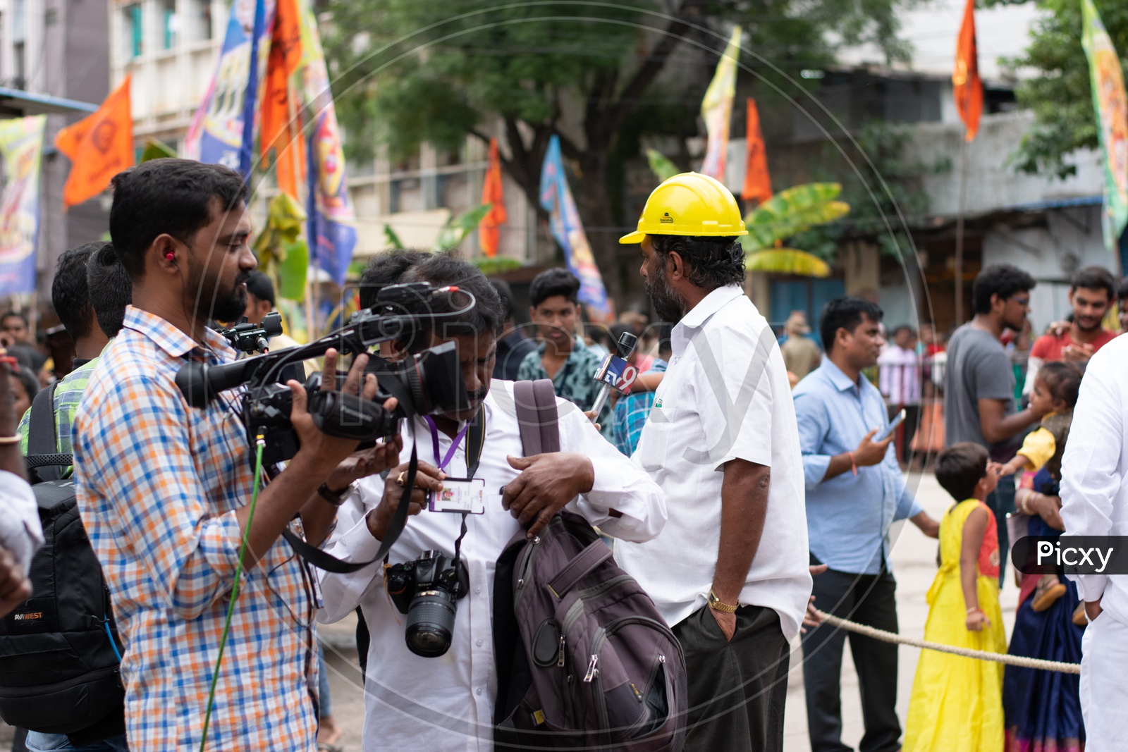 Man giving interview to Media or Journalists with Camera's