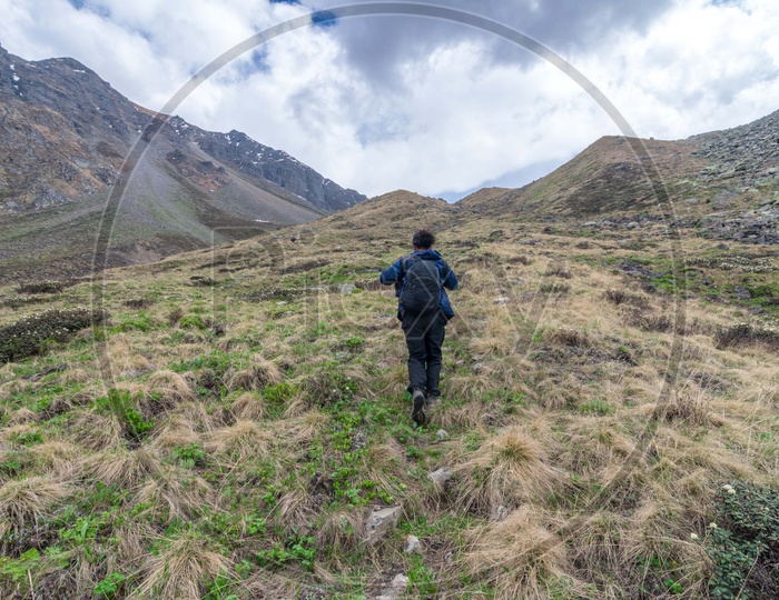 A Trekker walking along the mountain pass at Lahaul And Spiti