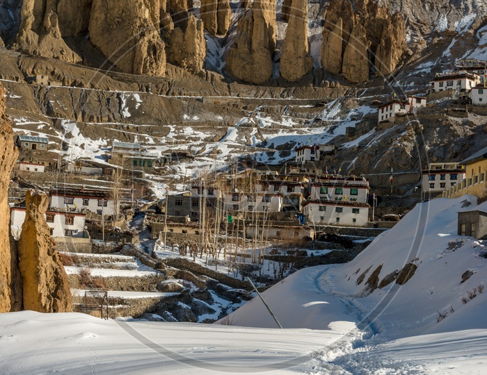 Village in Spiti on Rock Mountains Covered in Snow in Winter