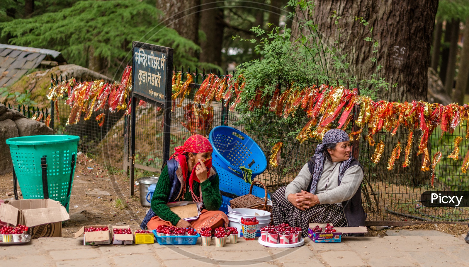 Local Women selling fruits at Hidimda Devi Temple in Manali