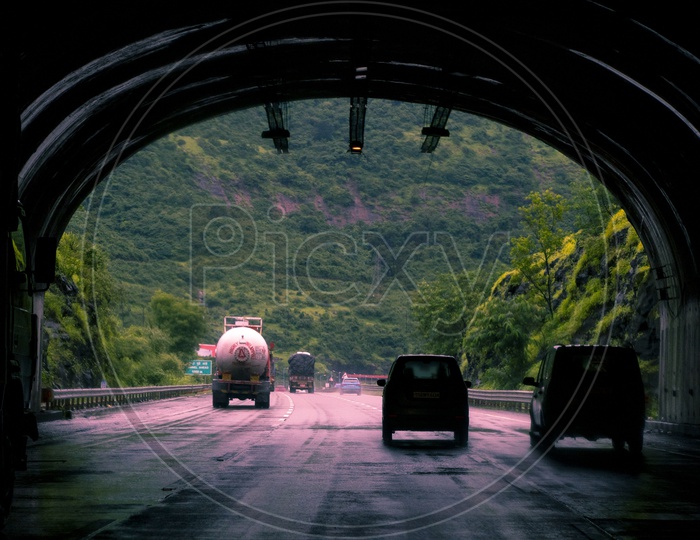 out of dark. Highway with tunnels
