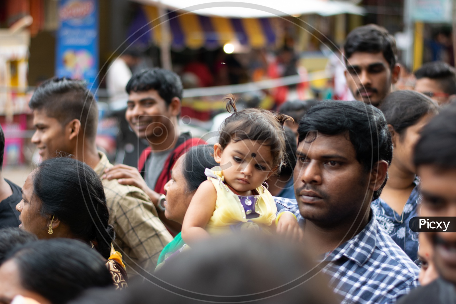 Father with his Child in Queue at Khairatabad Ganesh Temple