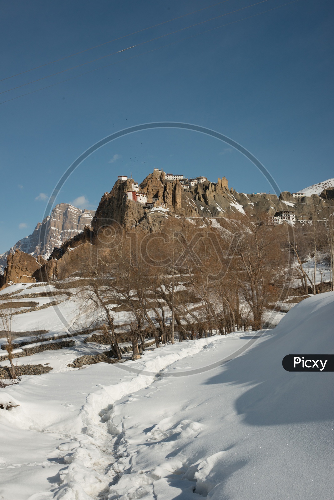 Dhankar Monastery on Mountain Surrounded by Snow in Winter