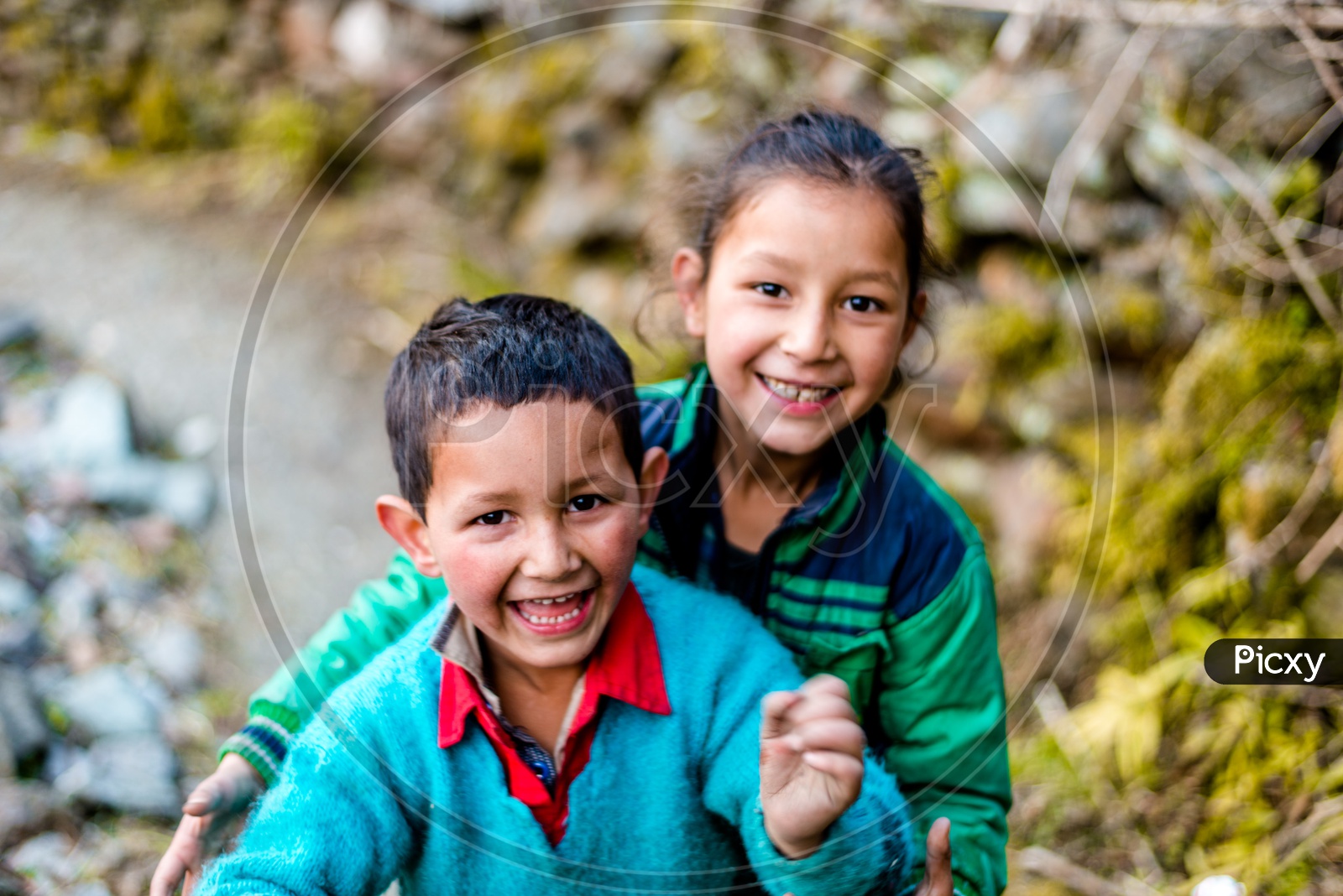 Portrait of Indian Brother and Sister Smiling and Playing