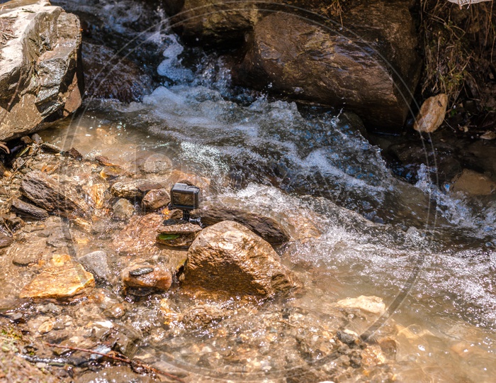 Action camera recording  timelapse of waterstream in Himalayas