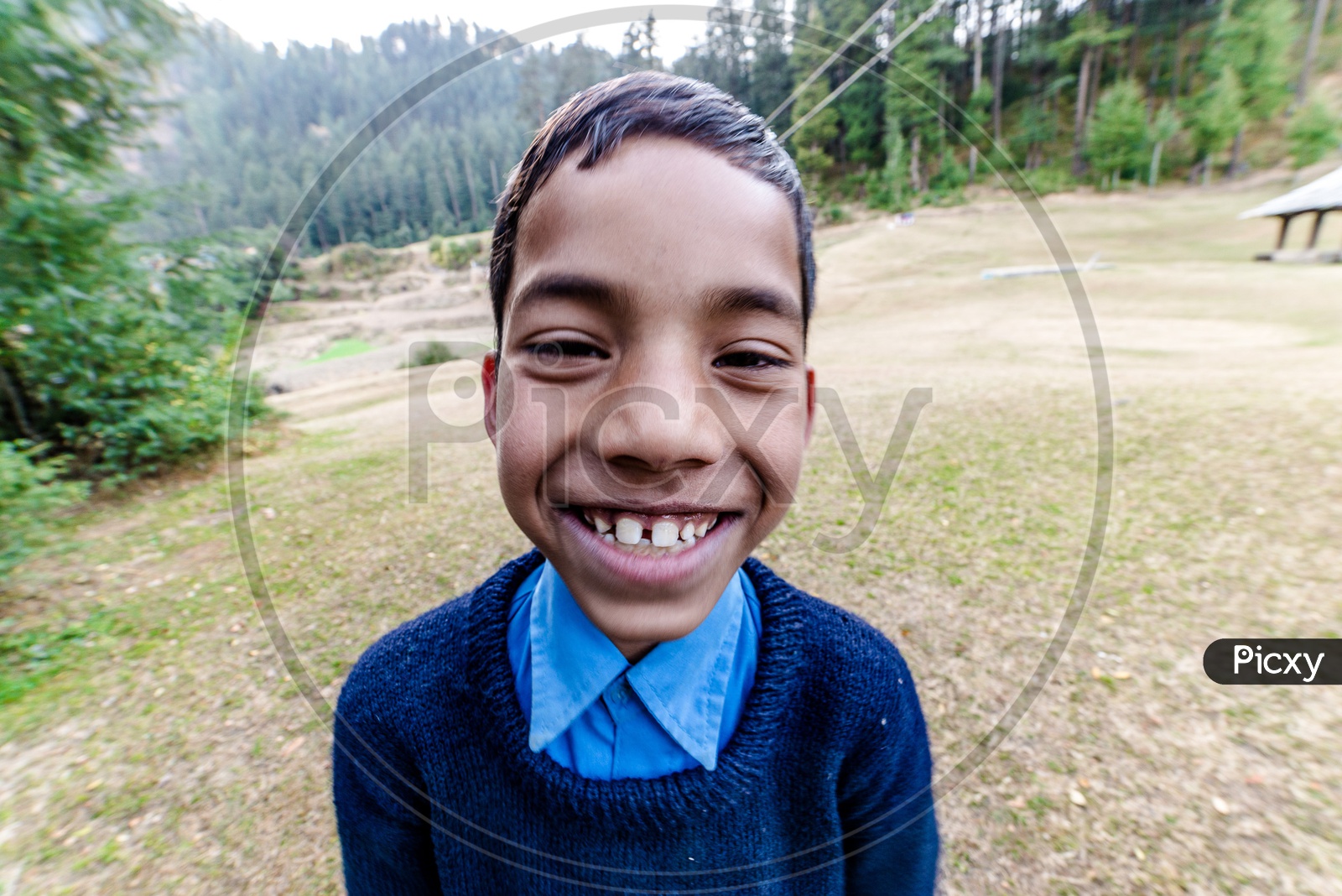 Portrait of a Himalayan Boy Smiling in School uniform