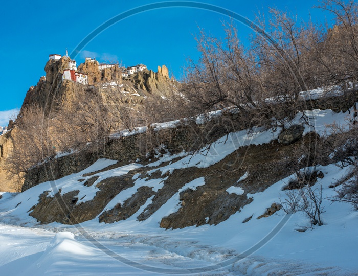 Dhankar Monastery on Mountain Surrounded by Snow in Winter Seasons