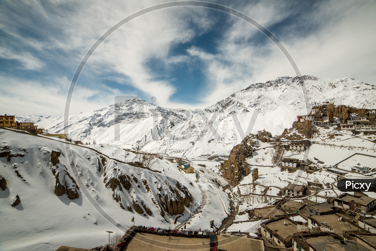 Beautiful Spiti Village Covered in Snow Surrounded by Himalayan Mountains