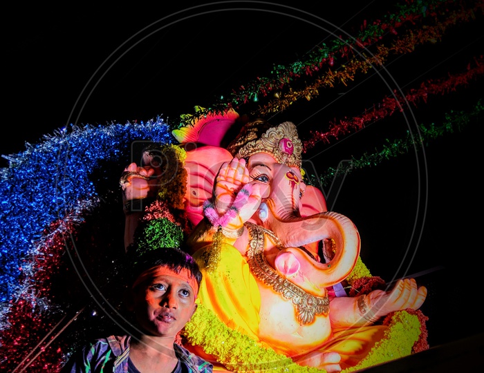 A sudden pose given by the boy while I'm capturing the lord Ganesha...