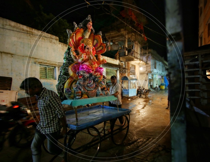 People taking Ganesh to the market places for selling