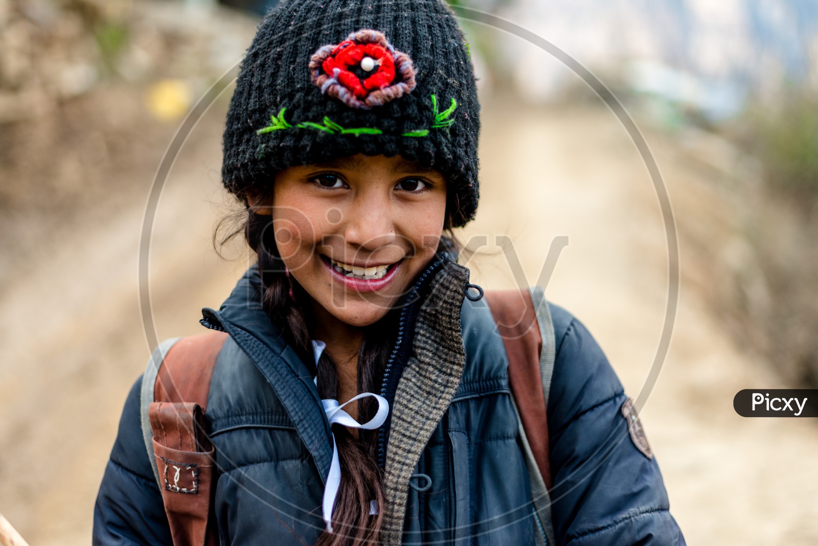 Portrait of Himalayan girl with Cap on Head