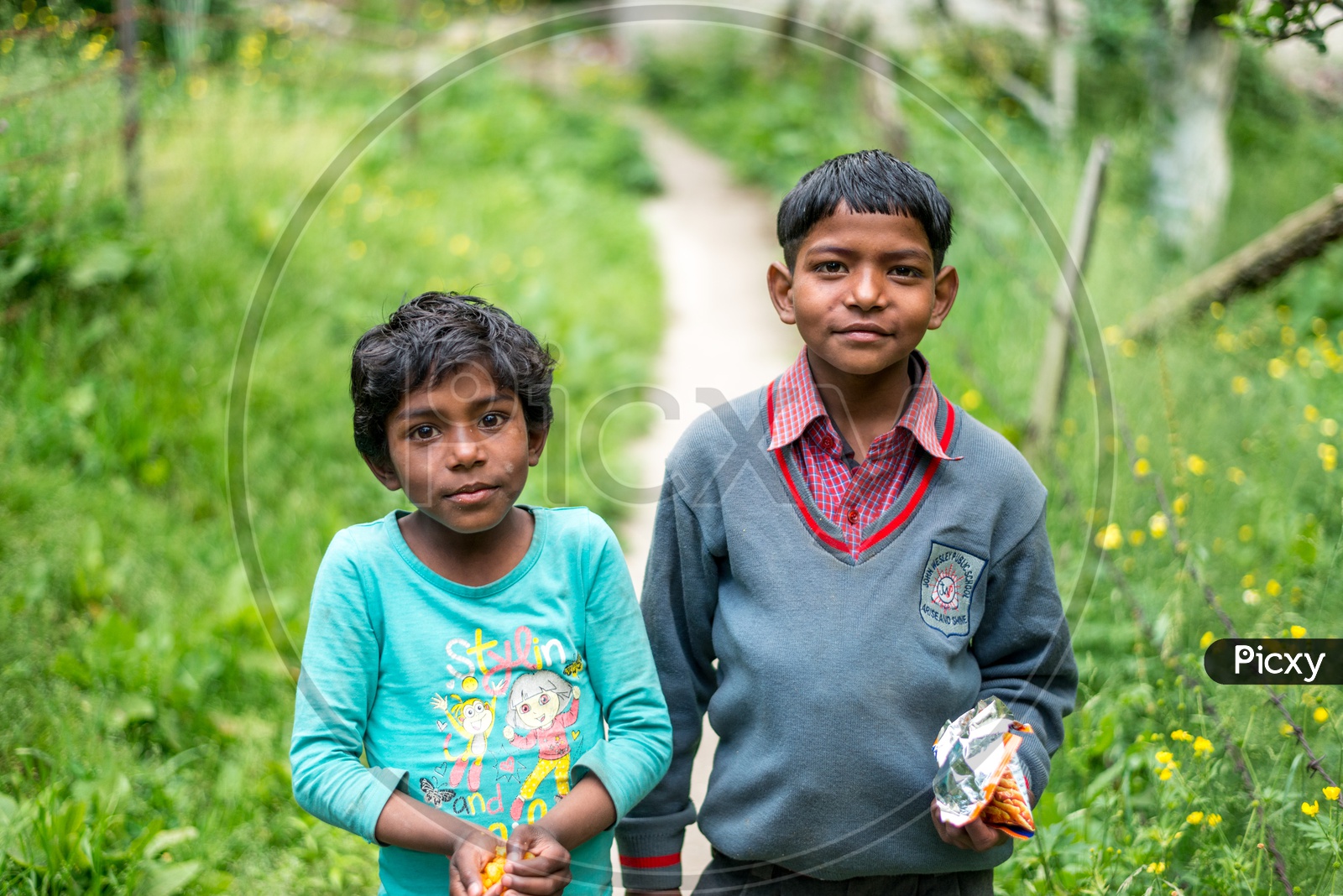 Portrait of Indian Kids in a Flower Garden